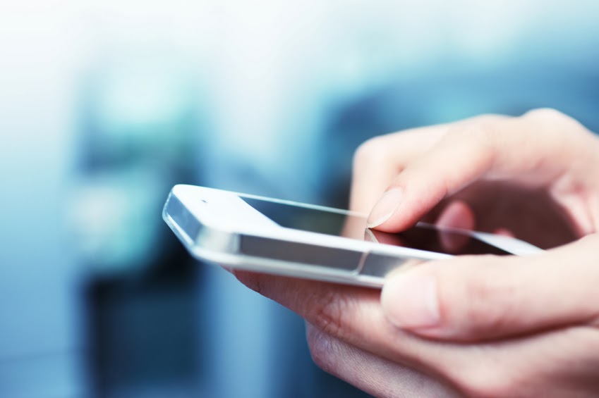 user is texting using smartphone