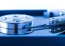 Open Hard Drive Showing Head and Platters