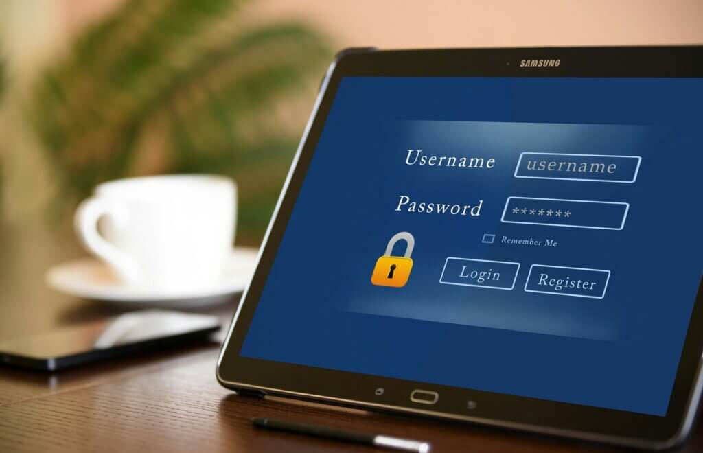 View all of your saved websites in Cyclonis password manager User account is logging in a tablet during coffee break