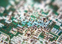 Green and black circuit board (PCB) designed with Altium Designer