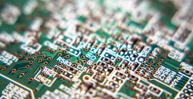 Green and black circuit board (PCB) designed with Altium Designer