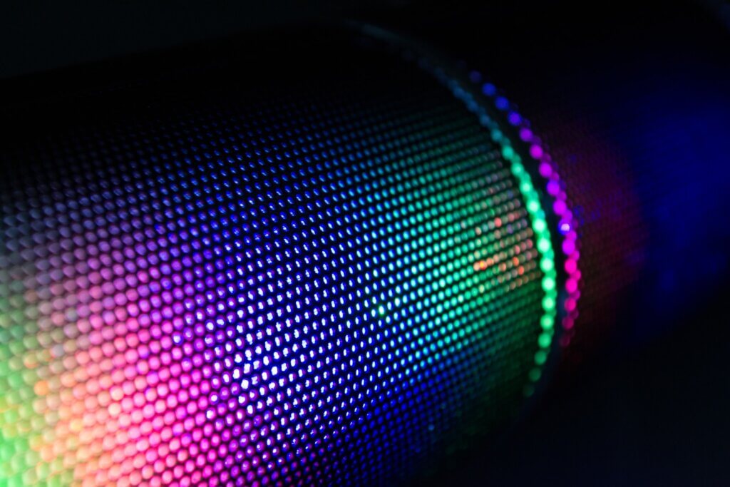 Horizontal Bluetooth speaker with rainbow-colored lights