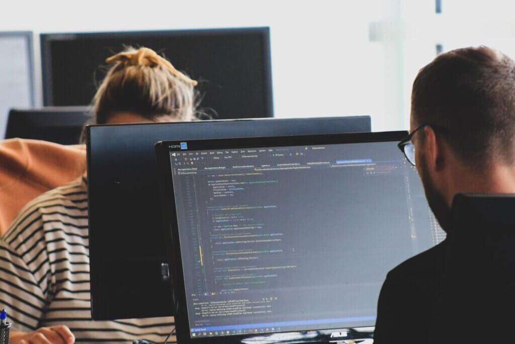 In-demand coding languages command top salaries Students sitting in front of computer monitors learn that in-demand coding languages command top salaries