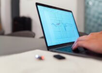 Laptop showing engineering graph used in data analytics careers