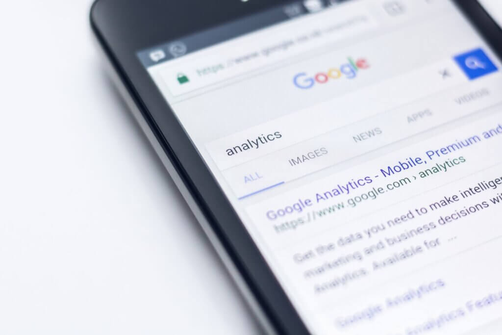 Smartphone showing Google search results for a keyword
