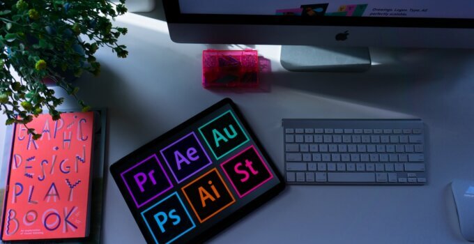 A beginner web designer's silver iMac and Apple keyboard