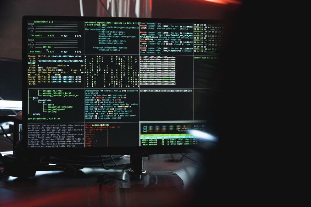 Computer Codes a black computer monitor showing codes on the screen